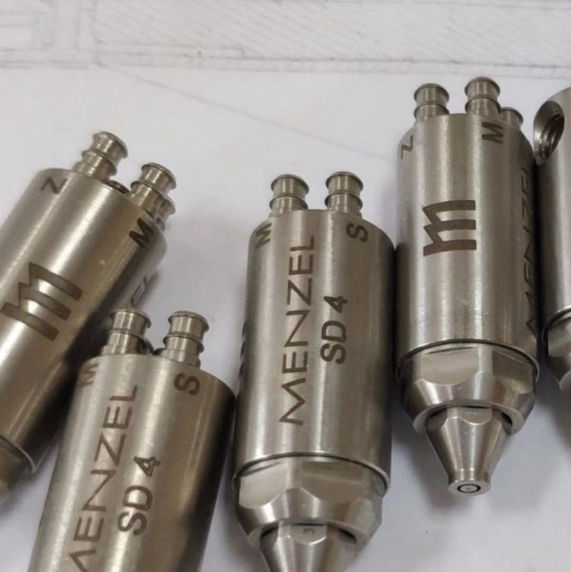 同轴喷涂头用于在工具和工件上或工具中施加粘性介质